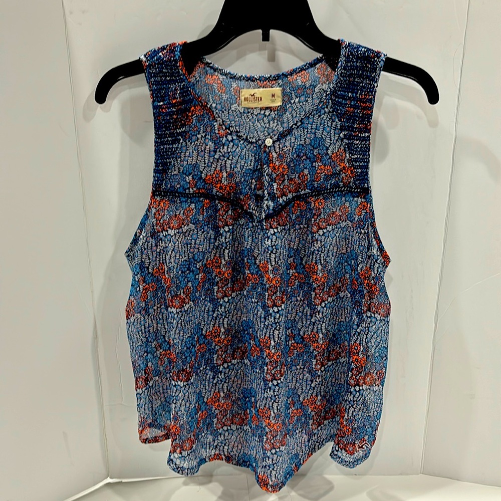 EUC Hollister Floral Smocked Semi Sheer Front Keyhole Shirttail Sleeveless Shirt